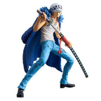 Action figure of a character with a blue outfit and a sword on a white background