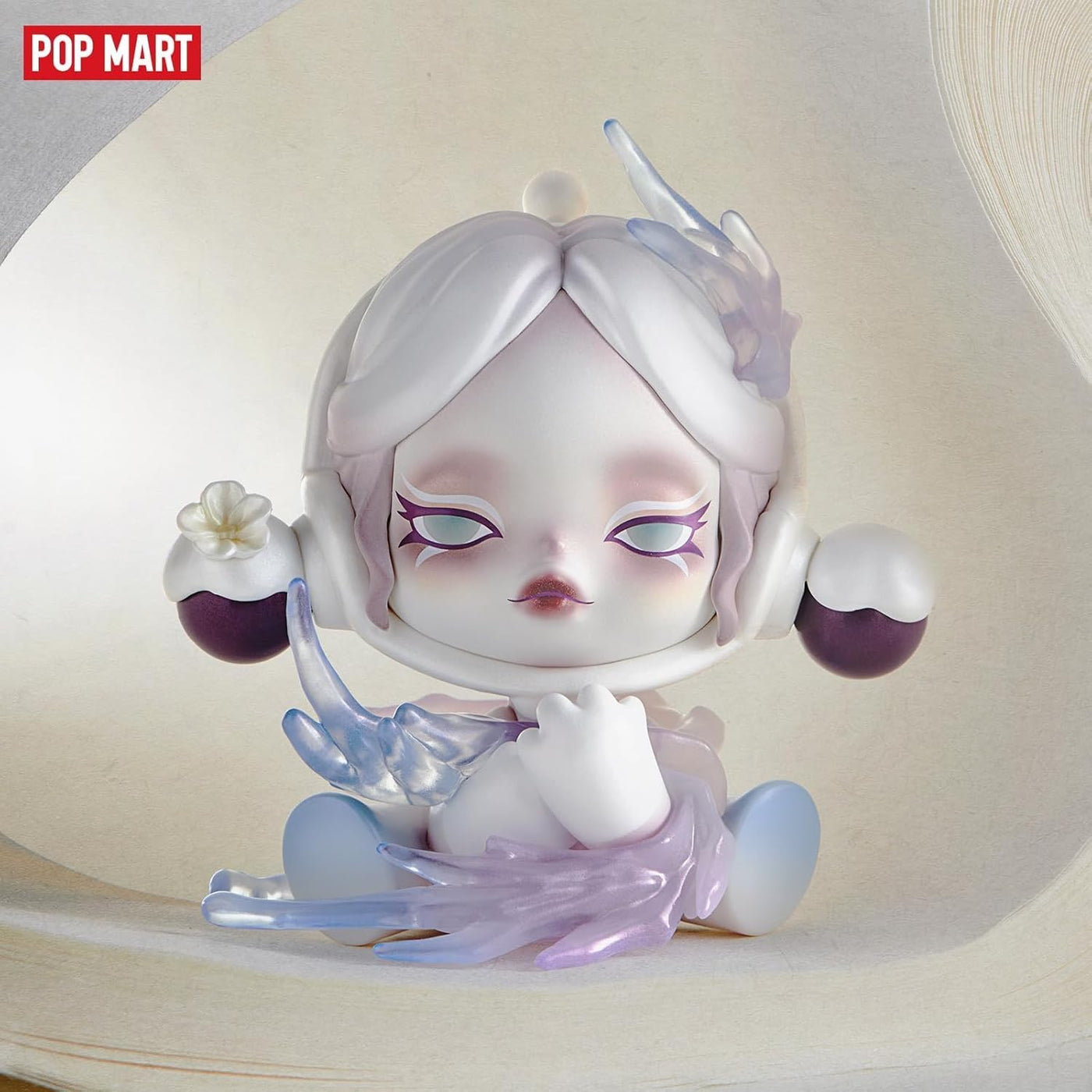 Animated character figurine with white hair and purple accents on a beige background, featuring the Pop Mart logo.