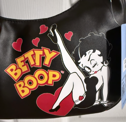 Betty Boop design on a product packaging with a white background